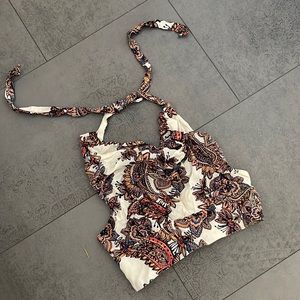 Free people crop top , flower pattern.